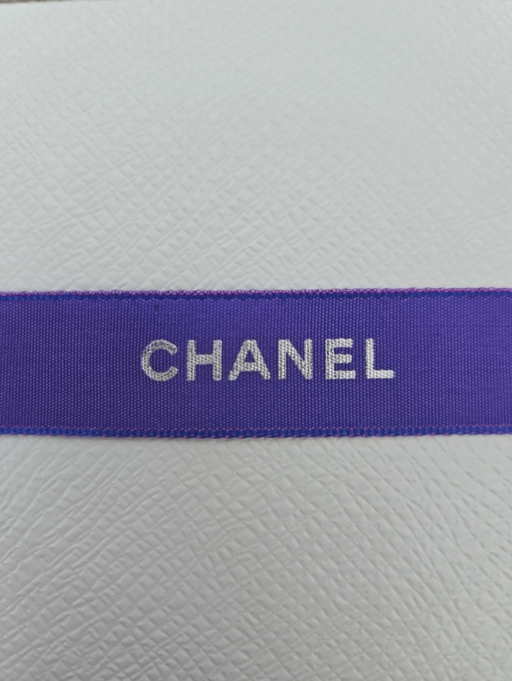 CHANEL Violet Ribbon with Silver Logo